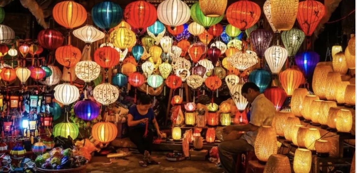 Silk lanterns illuminating a shop in Hội An